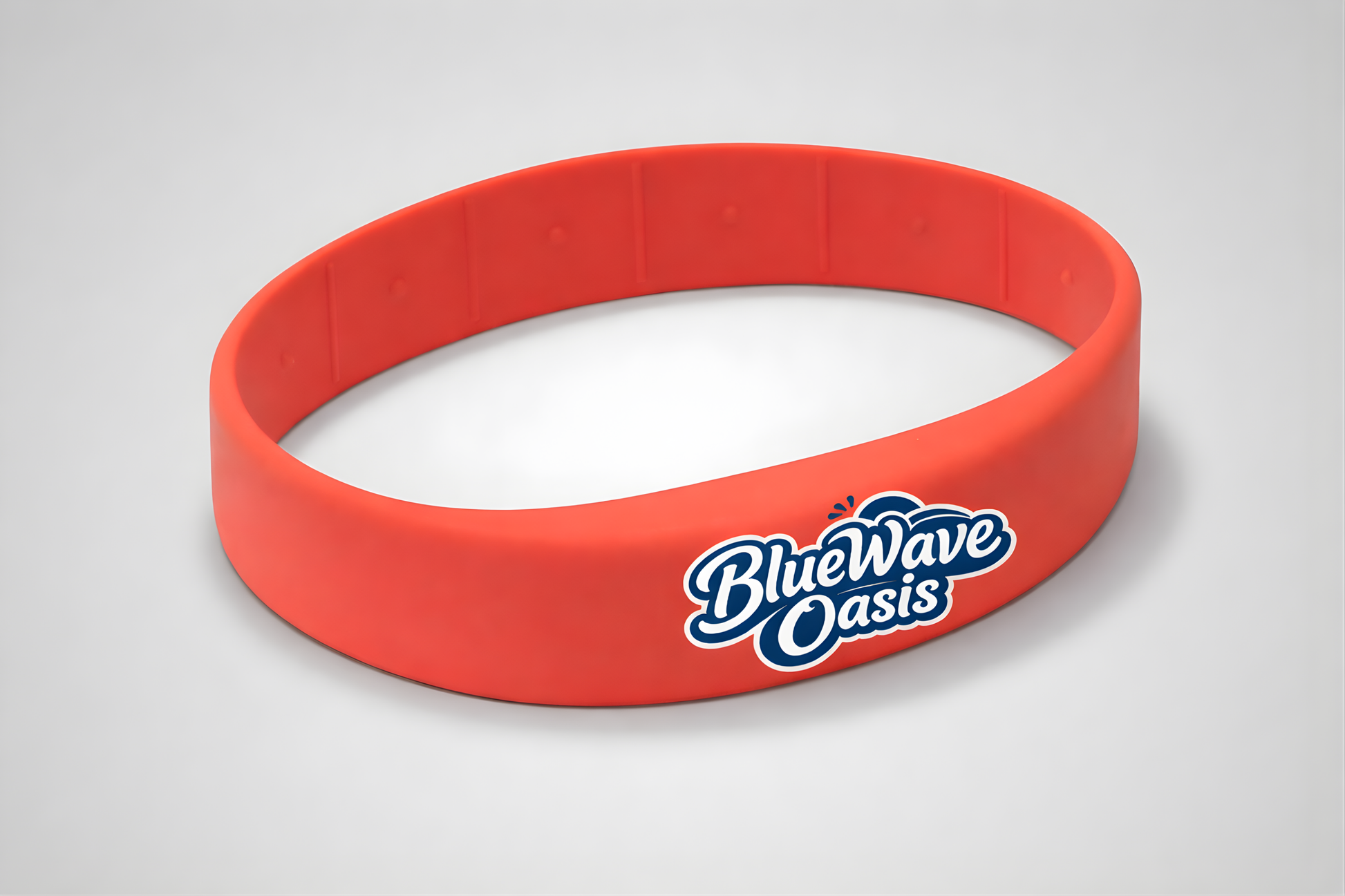 Un bracelet en silicone rouge avec NFC et votre propre logo de JM Band®
